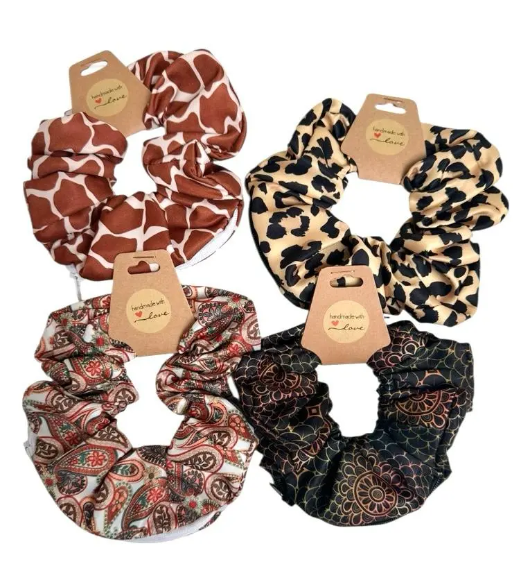 Haargummi mit Reißverschluss – Animal Print & Elegant